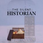 A cupboard carrying cushions and other decor