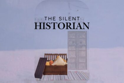 A cupboard carrying cushions and other decor