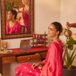 Karva Chauth 2026 outfit guide in a red saree with solah shringar from Fabindia
