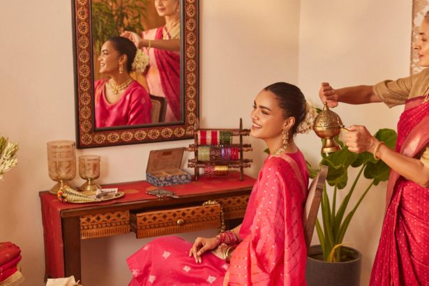 Karva Chauth 2026 outfit guide in a red saree with solah shringar from Fabindia