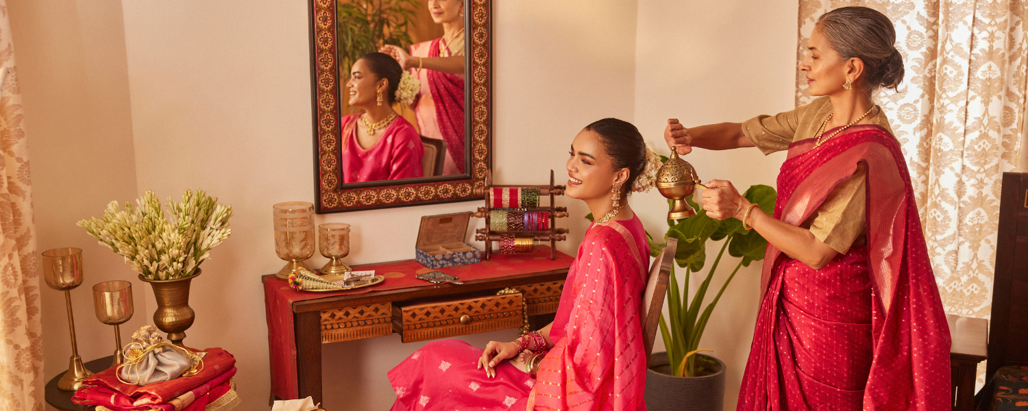Karva Chauth 2026 outfit guide in a red saree with solah shringar from Fabindia